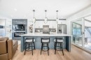 9215 Allison Drive Se, Calgary, AB  - Indoor Photo Showing Kitchen With Stainless Steel Kitchen With Upgraded Kitchen 
