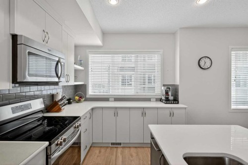 210 Nolanlake Villas Nw, Calgary, AB - Indoor Photo Showing Kitchen