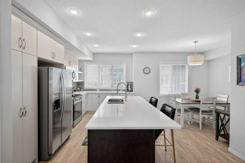 210 Nolanlake Villas Nw, Calgary, AB - Indoor Photo Showing Kitchen With Double Sink With Upgraded Kitchen