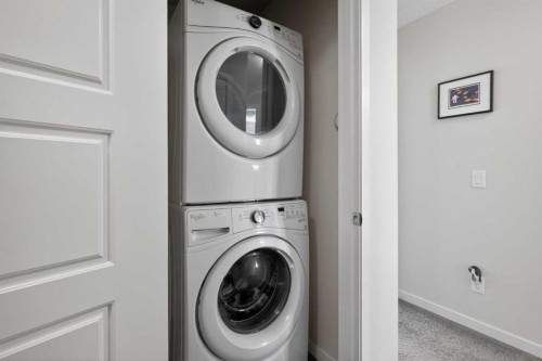 210 Nolanlake Villas Nw, Calgary, AB - Indoor Photo Showing Laundry Room