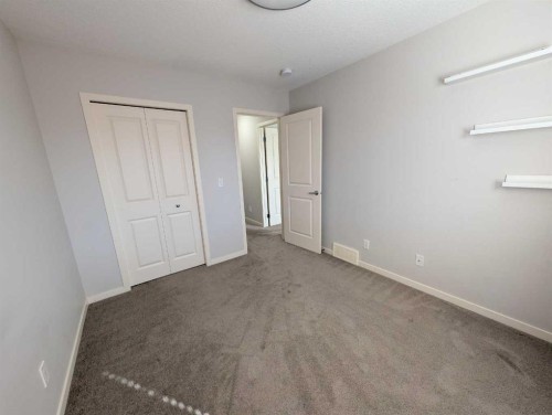 54 Seton Manor Se, Calgary, AB - Indoor Photo Showing Other Room