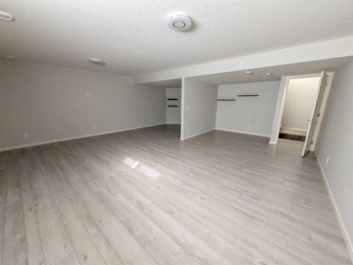 54 Seton Manor Se, Calgary, AB - Indoor Photo Showing Other Room