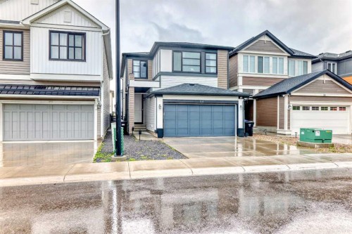 54 Seton Manor Se, Calgary, AB - Outdoor With Facade