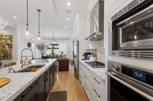 2012 49 Avenue Sw, Calgary, AB - Indoor Photo Showing Kitchen With Double Sink With Upgraded Kitchen