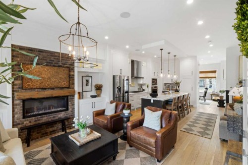 2012 49 Avenue Sw, Calgary, AB - Indoor Photo Showing Living Room With Fireplace