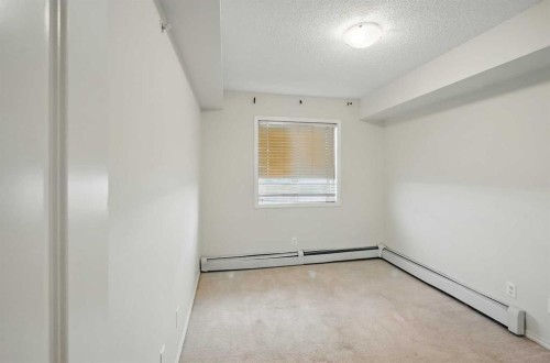 409-15 Saddlestone Way Ne, Calgary, AB - Indoor Photo Showing Other Room