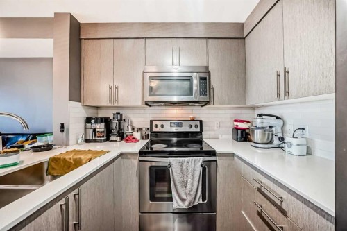 6409-302 Skyview Ranch Drive Ne, Calgary, AB - Indoor Photo Showing Kitchen With Stainless Steel Kitchen