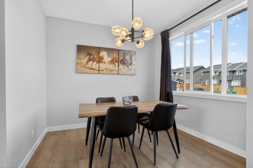 394 Sundown Road, Cochrane, AB - Indoor Photo Showing Dining Room