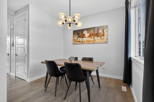 394 Sundown Road, Cochrane, AB - Indoor Photo Showing Dining Room
