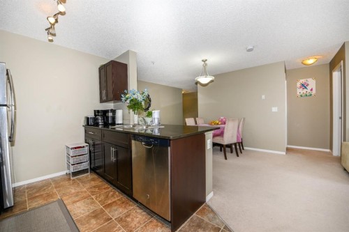302-5 Saddlestone Way Ne, Calgary, AB - Indoor Photo Showing Kitchen