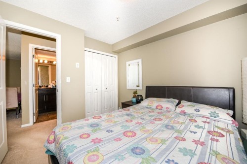 302-5 Saddlestone Way Ne, Calgary, AB - Indoor Photo Showing Bedroom
