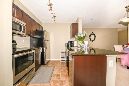 302-5 Saddlestone Way Ne, Calgary, AB - Indoor Photo Showing Kitchen