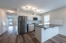 428 Cranbrook Square Se, Calgary, AB  - Indoor Photo Showing Kitchen With Stainless Steel Kitchen With Upgraded Kitchen 