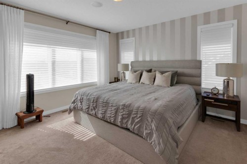 216 Sundown Road, Cochrane, AB - Indoor Photo Showing Bedroom