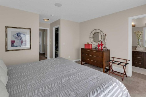 216 Sundown Road, Cochrane, AB - Indoor Photo Showing Bedroom