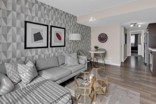 216 Sundown Road, Cochrane, AB - Indoor Photo Showing Living Room
