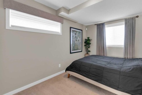 216 Sundown Road, Cochrane, AB - Indoor Photo Showing Bedroom