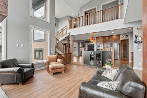 88 Crestridge Way Sw, Calgary, AB - Indoor Photo Showing Living Room With Fireplace
