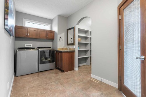 88 Crestridge Way Sw, Calgary, AB - Indoor Photo Showing Laundry Room