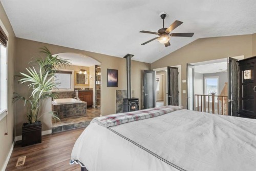 88 Crestridge Way Sw, Calgary, AB - Indoor Photo Showing Bedroom
