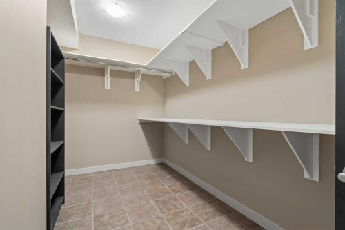 88 Crestridge Way Sw, Calgary, AB - Indoor With Storage