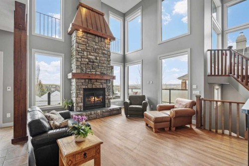 88 Crestridge Way Sw, Calgary, AB - Indoor Photo Showing Living Room With Fireplace