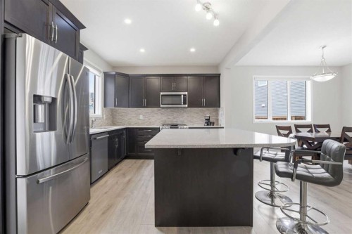 312 Carrington Way Nw, Calgary, AB - Indoor Photo Showing Kitchen With Stainless Steel Kitchen With Upgraded Kitchen