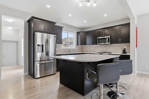 312 Carrington Way Nw, Calgary, AB - Indoor Photo Showing Kitchen With Stainless Steel Kitchen With Upgraded Kitchen