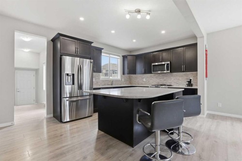 312 Carrington Way Nw, Calgary, AB - Indoor Photo Showing Kitchen With Stainless Steel Kitchen With Upgraded Kitchen