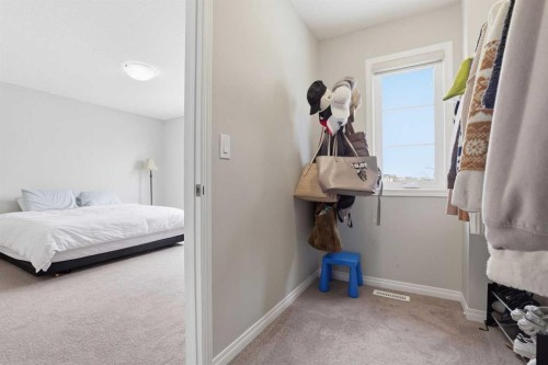 312 Carrington Way Nw, Calgary, AB - Indoor Photo Showing Bedroom