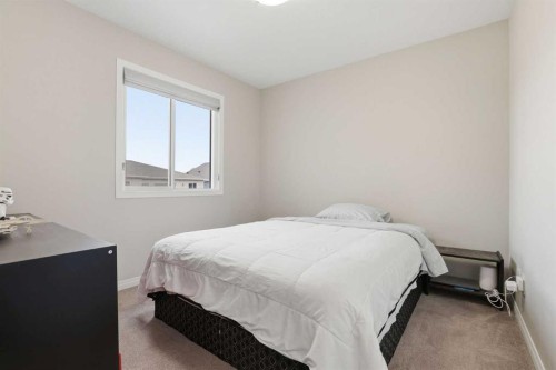 312 Carrington Way Nw, Calgary, AB - Indoor Photo Showing Bedroom