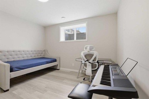 312 Carrington Way Nw, Calgary, AB - Indoor Photo Showing Bedroom