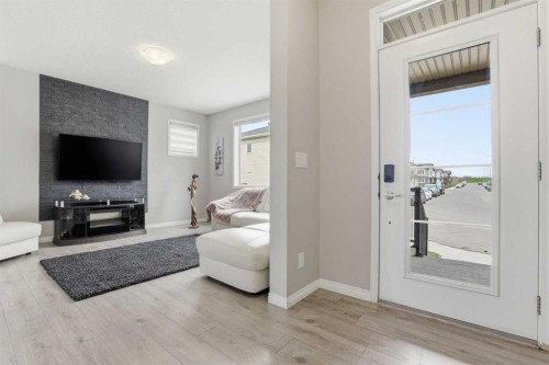 312 Carrington Way Nw, Calgary, AB - Indoor Photo Showing Living Room