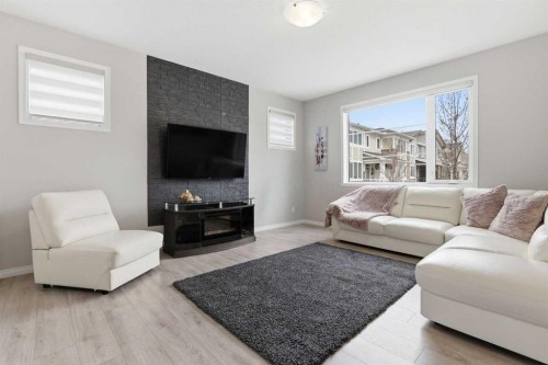 312 Carrington Way Nw, Calgary, AB - Indoor Photo Showing Living Room