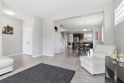 312 Carrington Way Nw, Calgary, AB - Indoor Photo Showing Living Room