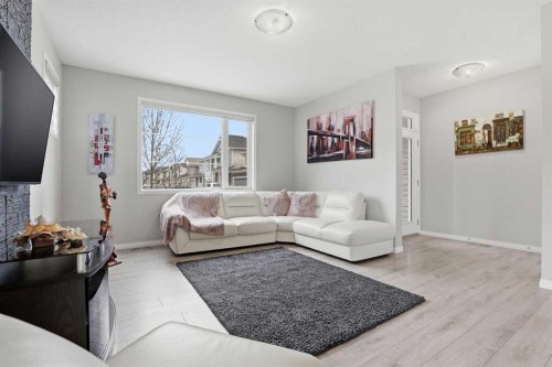312 Carrington Way Nw, Calgary, AB - Indoor Photo Showing Living Room