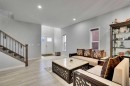 50 Saddlestone Place Ne, Calgary, AB  - Indoor Photo Showing Living Room 