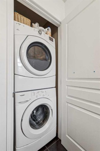 94 West Springs Way Sw, Calgary, AB - Indoor Photo Showing Laundry Room