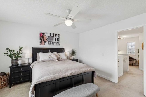 94 West Springs Way Sw, Calgary, AB - Indoor Photo Showing Bedroom