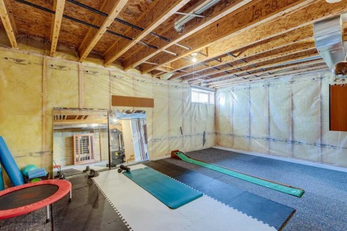 94 West Springs Way Sw, Calgary, AB - Indoor Photo Showing Basement