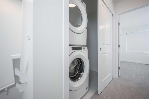 302-8535 19 Avenue Se, Calgary, AB - Indoor Photo Showing Laundry Room