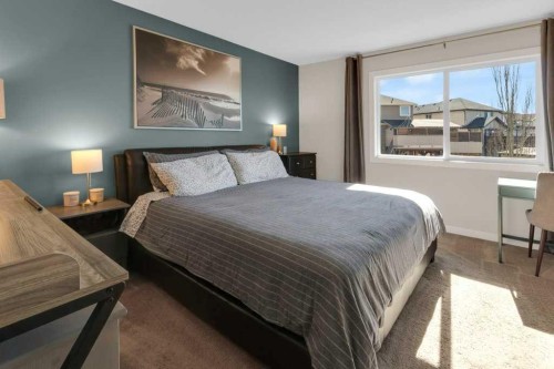 26 Heritage Landing, Cochrane, AB - Indoor Photo Showing Bedroom