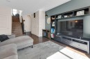 26 Heritage Landing, Cochrane, AB  - Indoor Photo Showing Living Room 
