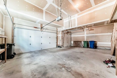 210 Stonemere Green, Chestermere, AB - Indoor Photo Showing Garage