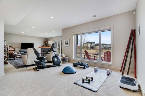 168 West Creek Landing, Chestermere, AB - Indoor Photo Showing Gym Room