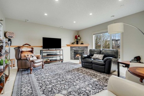 168 West Creek Landing, Chestermere, AB - Indoor Photo Showing Living Room With Fireplace