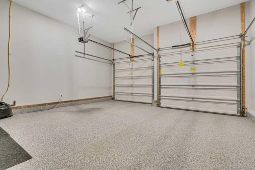 168 West Creek Landing, Chestermere, AB - Indoor Photo Showing Garage