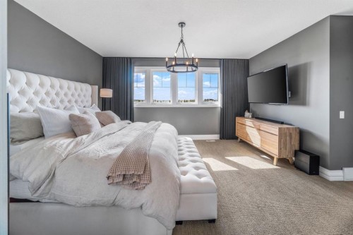 103 Brome Bend, Rural Rocky View County, AB - Indoor Photo Showing Bedroom
