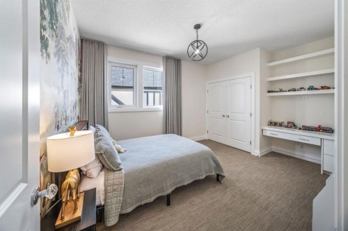 103 Brome Bend, Rural Rocky View County, AB - Indoor Photo Showing Bedroom