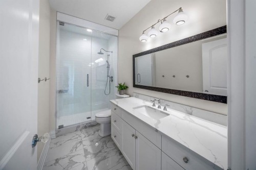 103 Brome Bend, Rural Rocky View County, AB - Indoor Photo Showing Bathroom